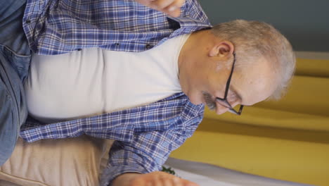vertical video of happy old man dancing.