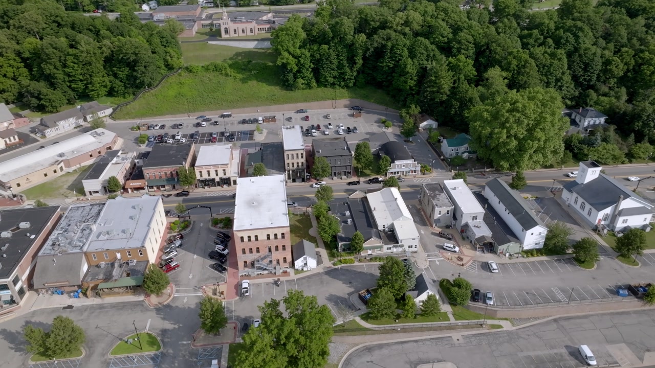 Newaygo, Michigan downtown with drone video moving in a circle.