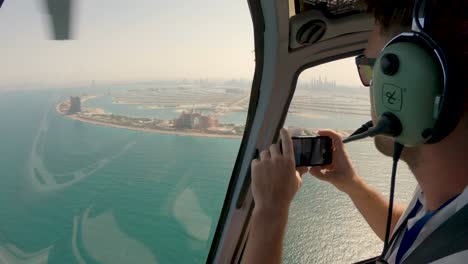 helicopter view over dubai, tourist sightseeing in dubai.