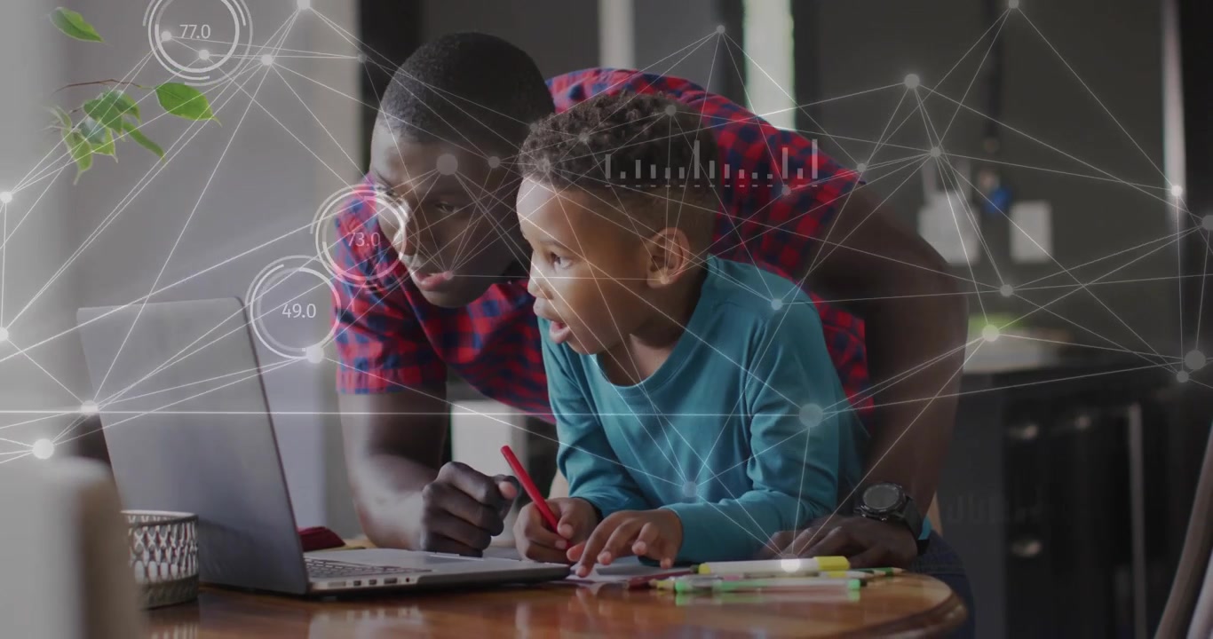 Vertical video: Dad pointing at laptop helping son writing red pen, graphs over it aiding education