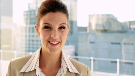pretty businesswoman smiling at camera