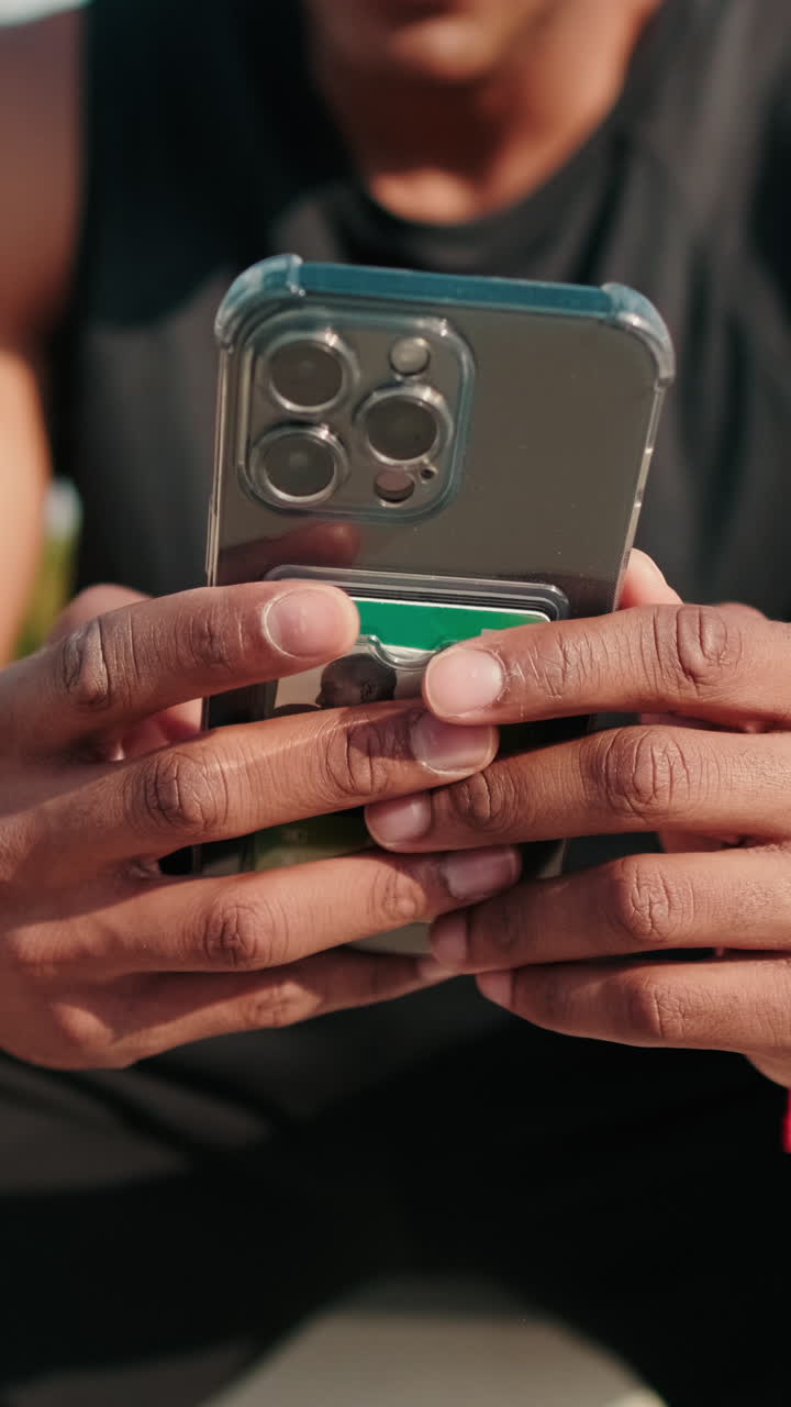 Athlete Checks Phone After Outdoor Workout