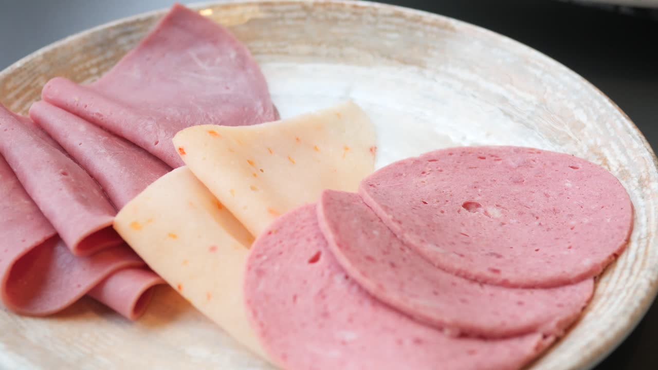 Salami sausage cut into thin pieces