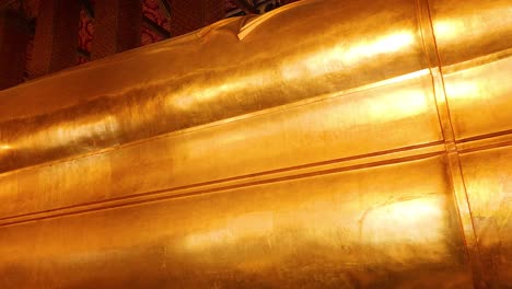 close-up views of the reclining buddha statue