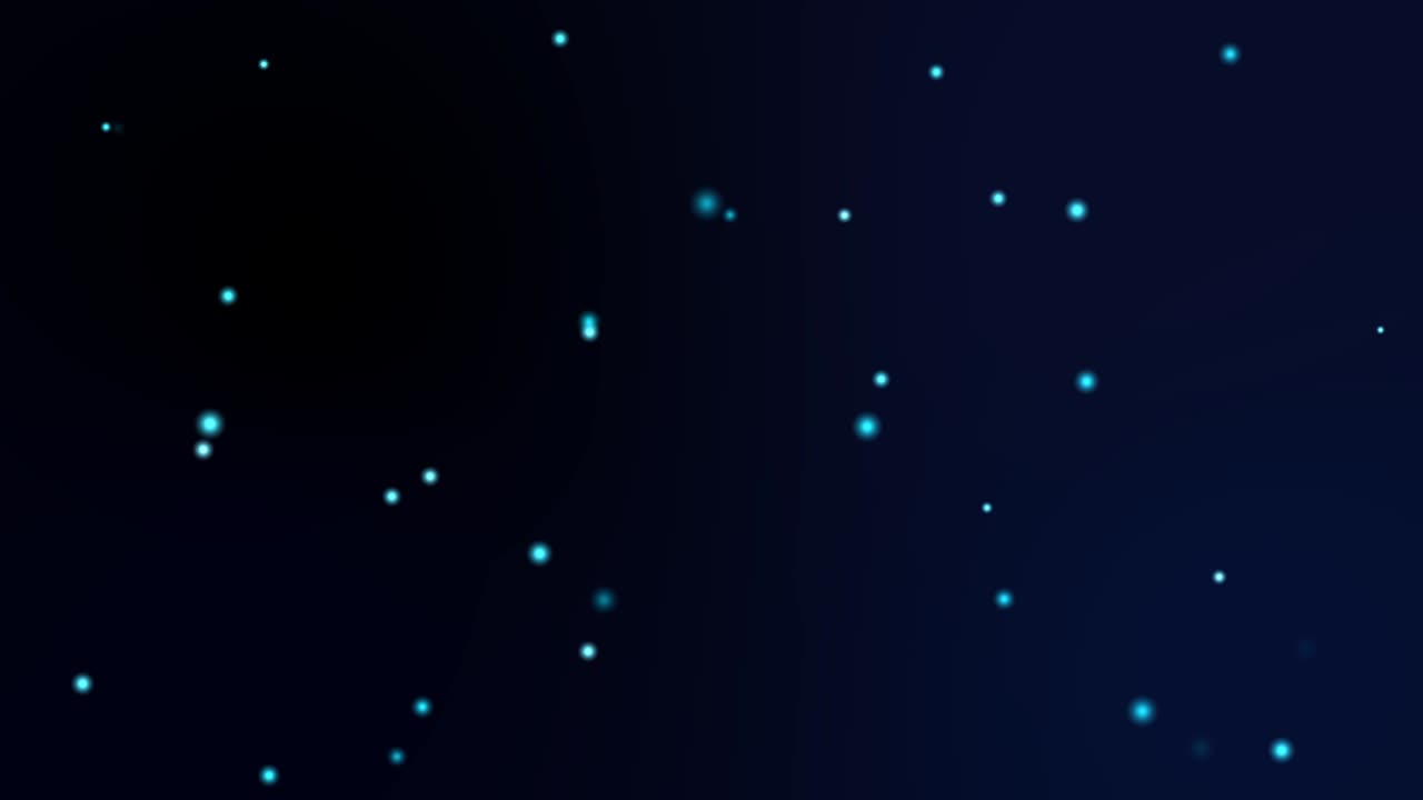 el movimiento de las partículas de brillo borroso y de nieve se desvanece lentamente en el fondo de la pantalla azul oscuro
