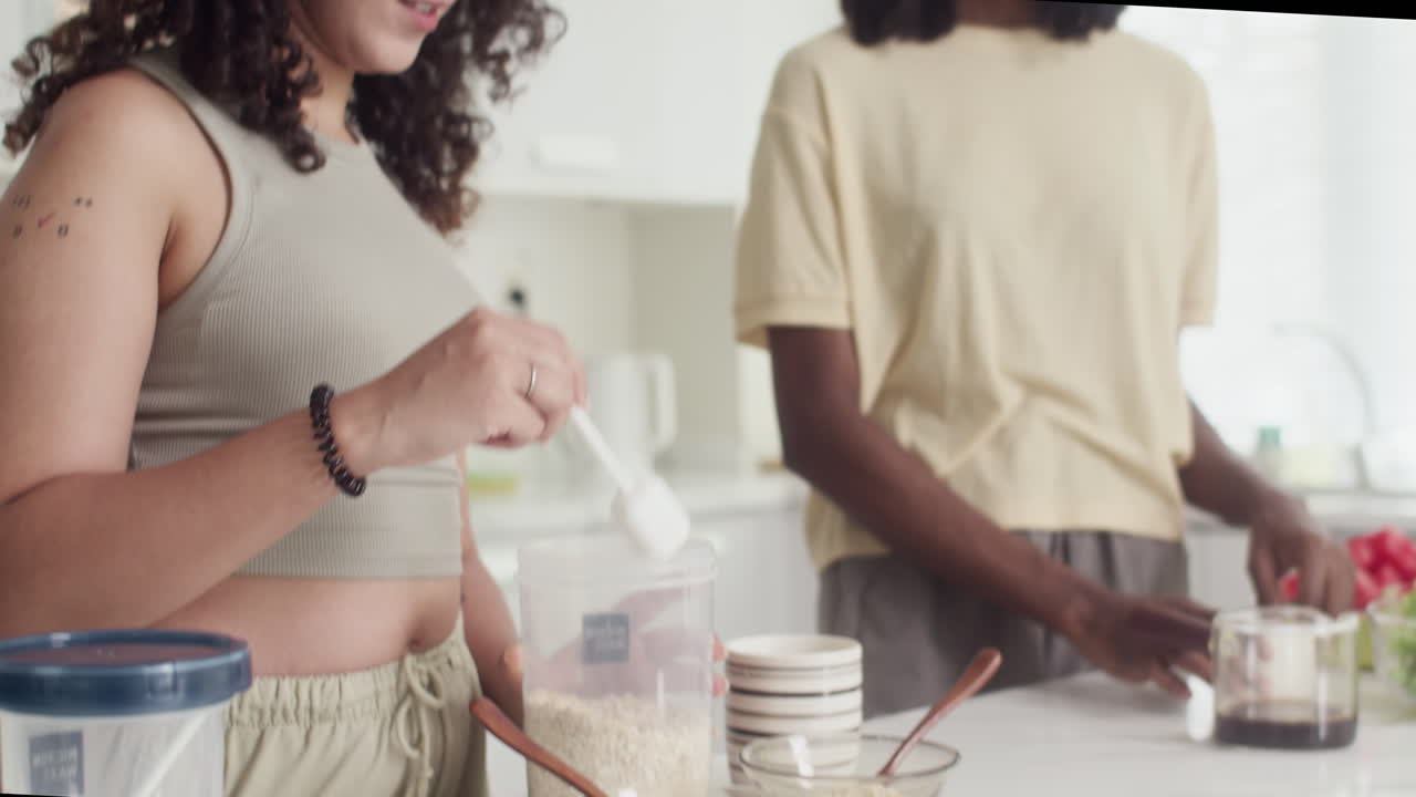 Friends Cooking Breakfast at Kitchen