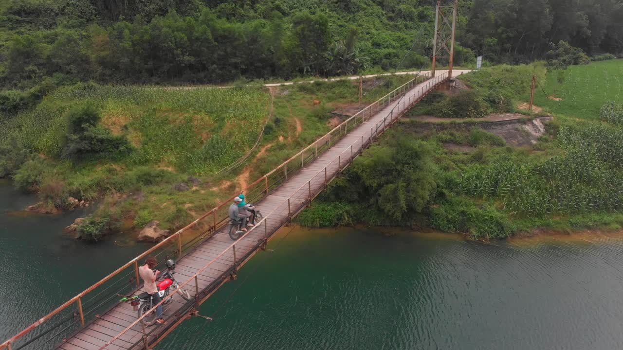 Old suspension bridge over Con river at Phong nha at Vietnam, aerial