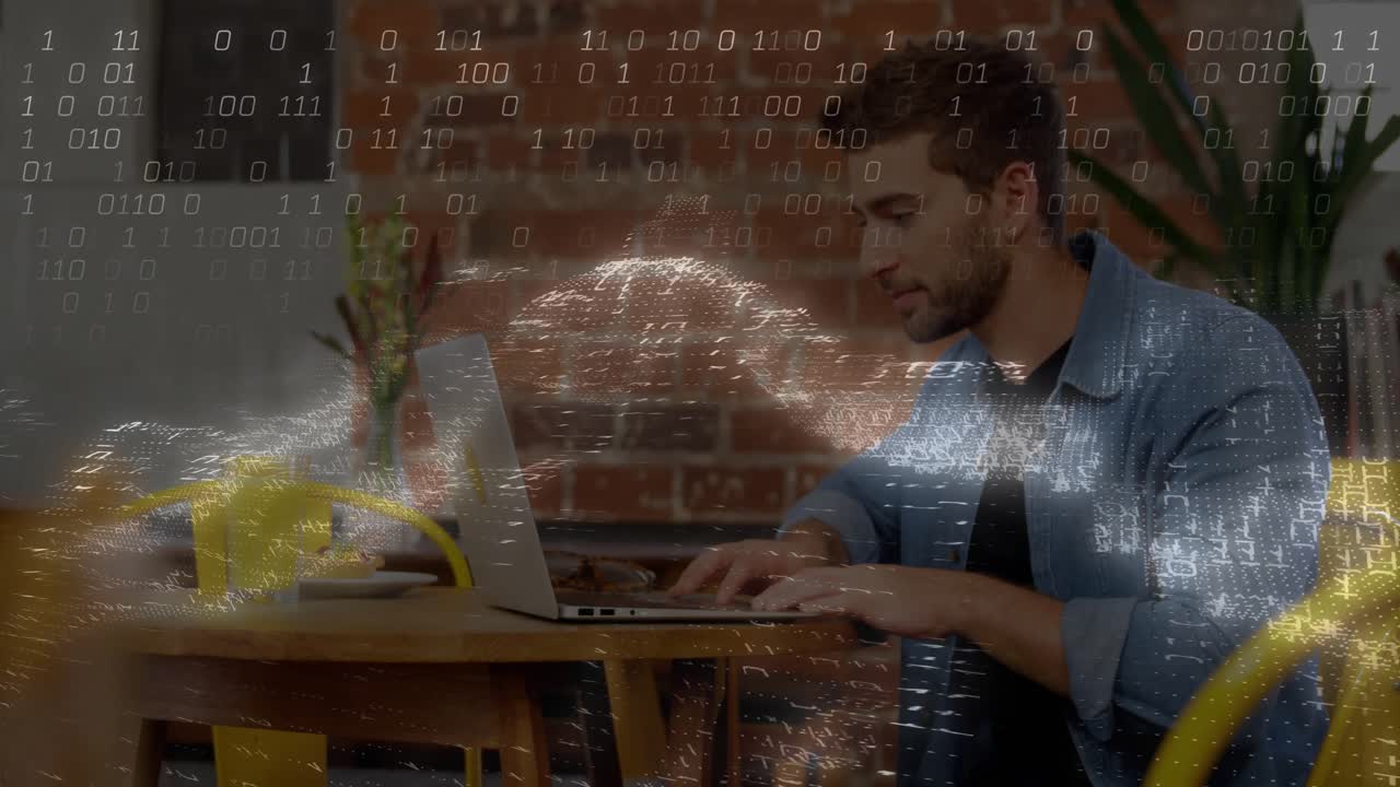 man typing on laptop in technology workspace, data charts floating above wooden table