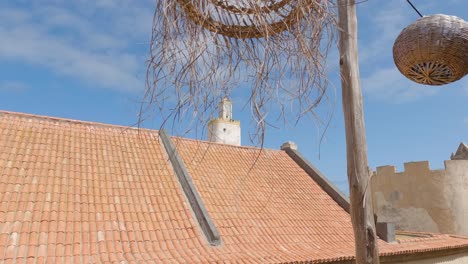 Grand-Mosque-of-Mazagan-Revealed-from-Nearby-Rooftop-in-El-Jadida,-Morocco