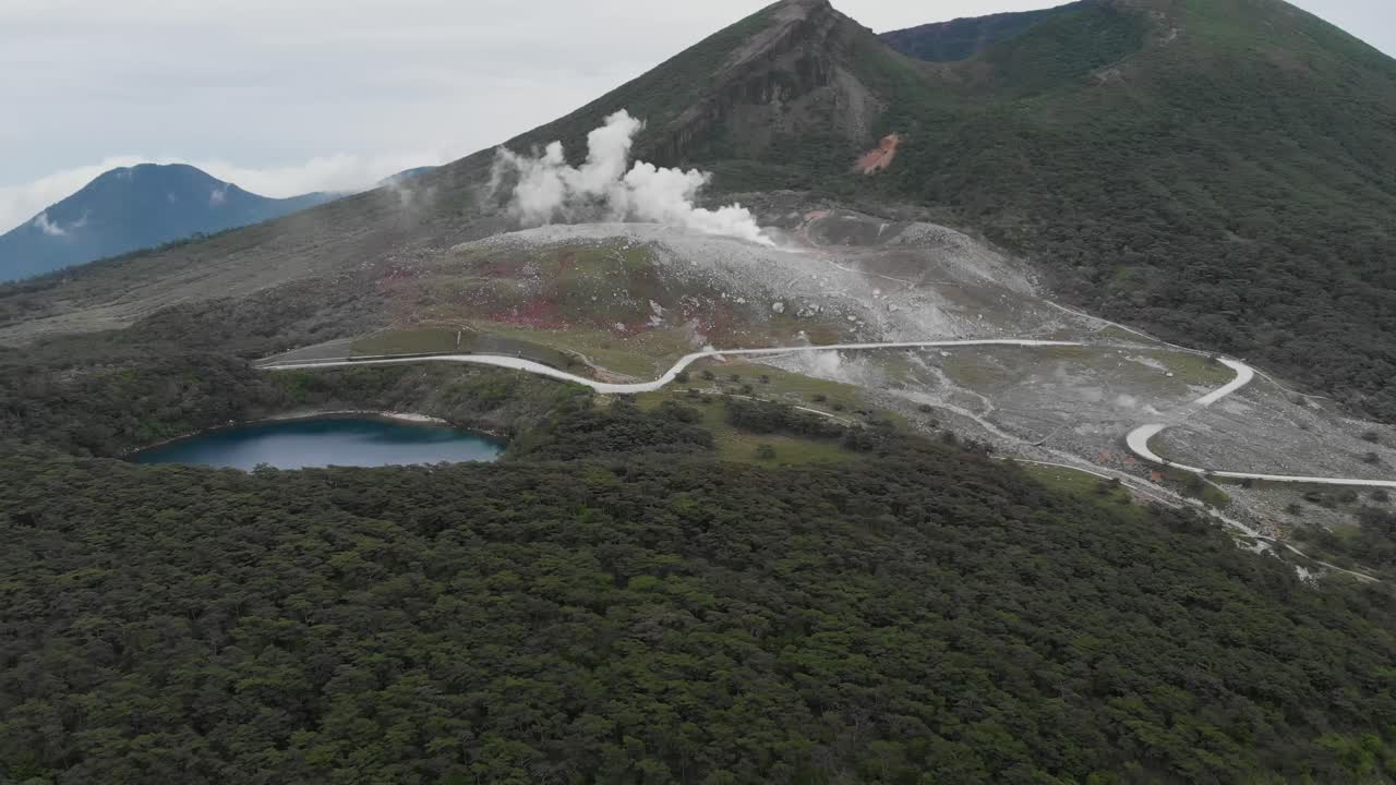 Drone Establishing of Mount Kirishima Volcano, Eruption Smoke, Forested Range in Japan