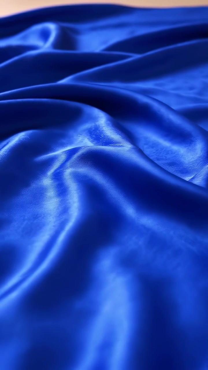 Sfondo di tessuto di raso blu fluente