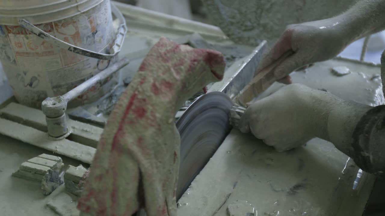 Macro stone cutting in a dusty workshop