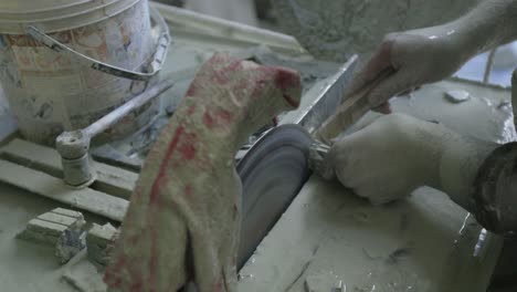 Macro-stone-cutting-in-a-dusty-workshop