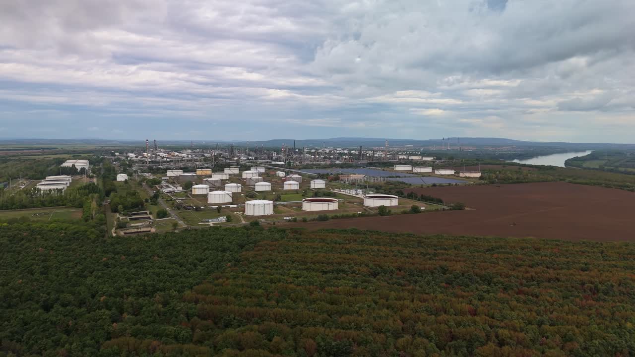 Orbital aerial view of the Mol Danube Oil Refinery industrial complex in Százhalombatta, Hungary