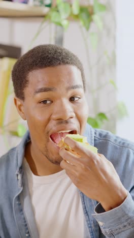 young man eating a healthy snack