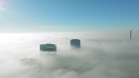 sunlit aerial journey: drone gracefully moves forward between towering skyscrapers