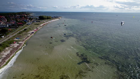 Kitesurfing-On-The-Baltic-Sea-In-Summer-Near-Kuznica-In-Pomerania,-Poland