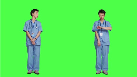 Medical-assistant-being-impatient-against-greenscreen-backdrop