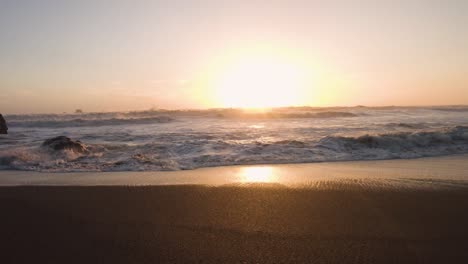 sunset over sandy california beach