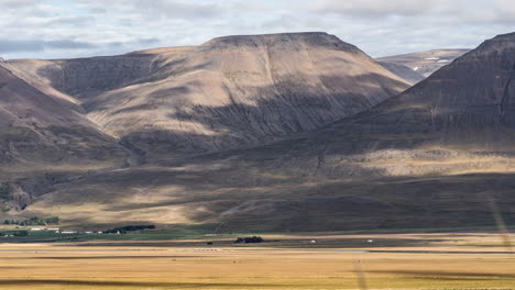 -Shadows-moving-by-the-mountains,-timelapse