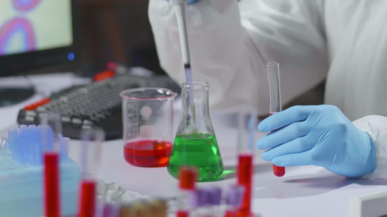 Development Of New Vaccines.Hand Of Scientist Holding Flask With Lab Glassware And Test Tubes In Chemical Laboratory Background, Science Laboratory Research And Development