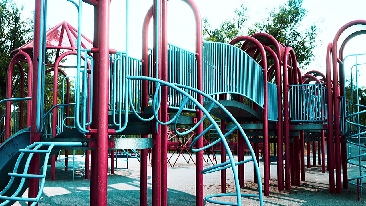 Empty swings on summer kids playground