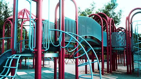 Empty-swings-on-summer-kids-playground
