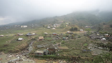 foggy mountain village with rice terraces in vietnam