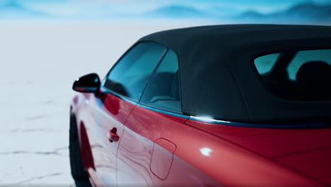 red audi convertible in the desert