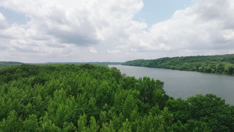 Aerial-Above-Lush-Forest-On-The-Bank-Of-Tennessee-River