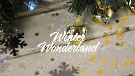 Animation-of-winter-wonderland-text-over-christmas-decorations