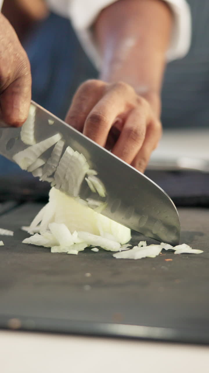 Chef chopping onions
