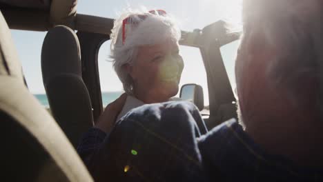 Senior-couple-sitting-in-a-car