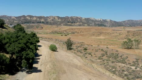 an aerial view over charlie canyon in castaic, california.