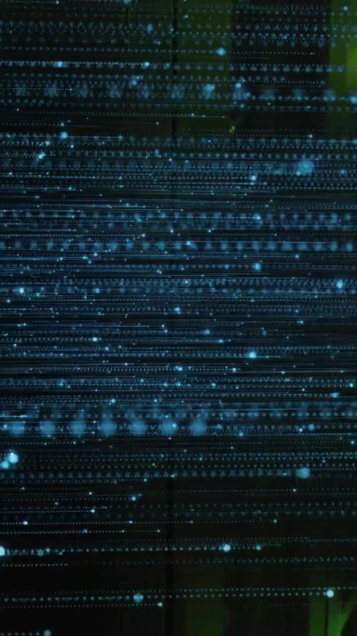 Animation of illuminated moving dots over data server room in background