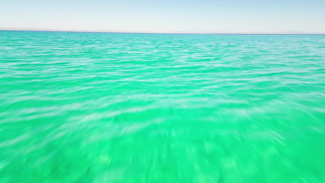 Crystal-clear water of Tecolotito beach in La Paz, Mexico, calm and serene