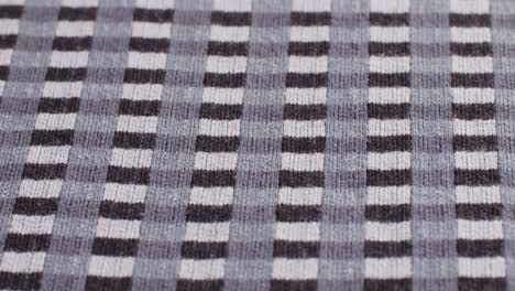 checkered print textile cloth texture close-up macro. black and white clothes.fashion fabric multicolor.high quality 4k footage