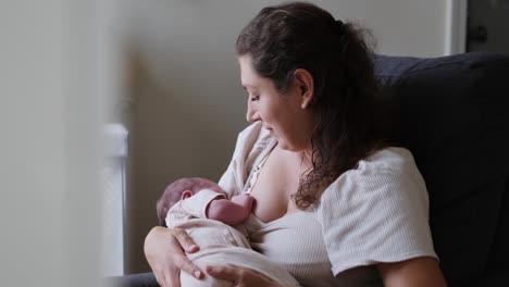 a mother lovingly breastfeeds her newborn child embodying the essence of early parenthood and their a mother lovingly breastfeeds her newborn child embodying the essence of early parenthood and their strong bond