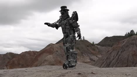 walking metal robot in a mountainous landscape