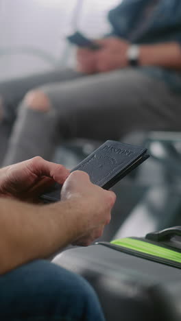 person holding a passport at the airport