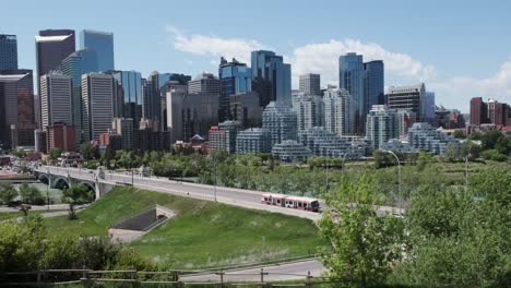 Shot-pans-with-traffic-on-an-urban-river-bridge