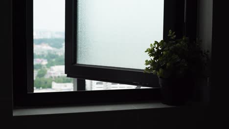 city view through window, modern apartment