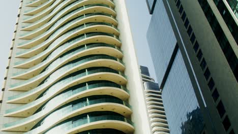modern architectural skyscraper with curved balconies
