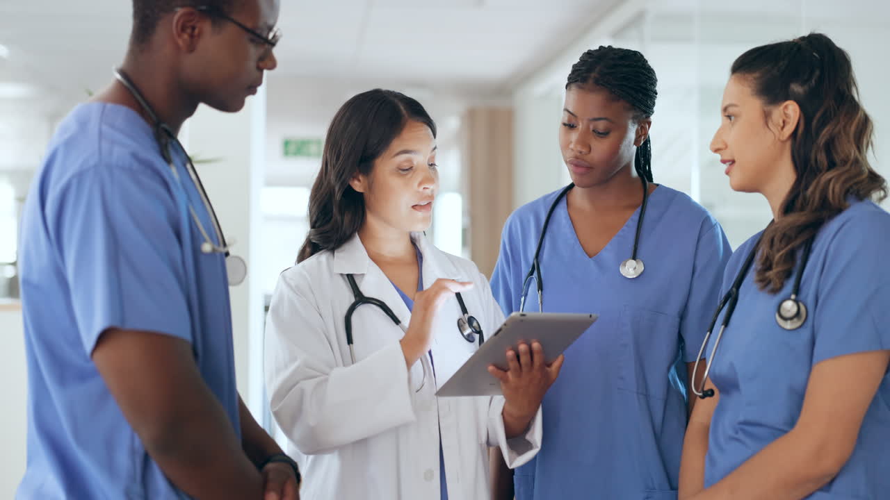 Staff, doctors and nurses with tablet