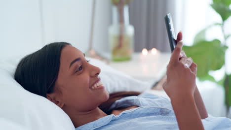 Happy-woman,-phone-and-typing-in-bed