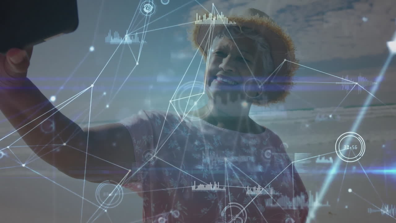 Elderly woman taking selfie over digital network and data visualization animation