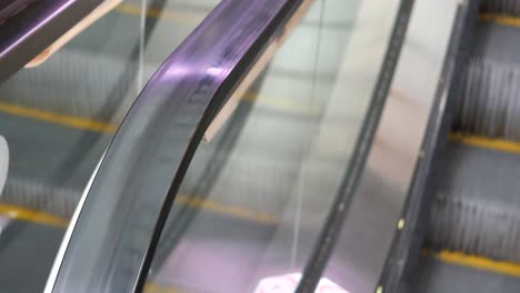 close-up of escalator handrail