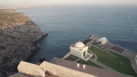 walled fort of santo antonio de belixe overlooking atlantic sea and limestone cliffs, algarve