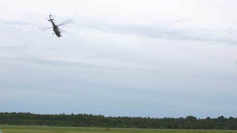 plz w-3 sokol sars helicopter demonstrating stunts at baltic international airshow, handheld shot, 4k