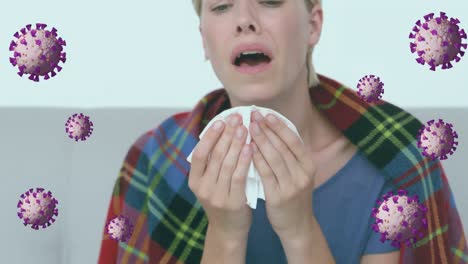 animation of virus cell over sick caucasian woman having running nose